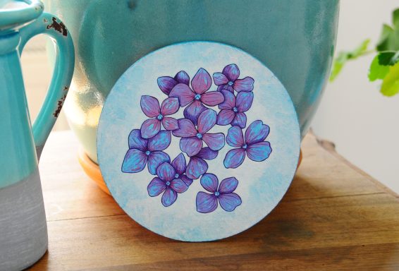 gouache painting of hydrangea flowers on round canvas board